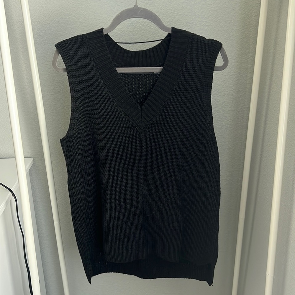 V-neck black sweater vest